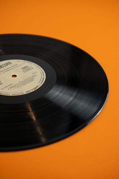 Image of a record album in an orange background