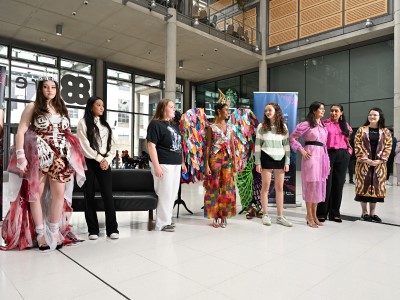 Junk Kouture event, models pose with their recycled materials
